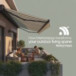 Couple relaxing under a modern Markiseteppe awning on a stylish outdoor terrace, enjoying food and comfort in shaded sunlight